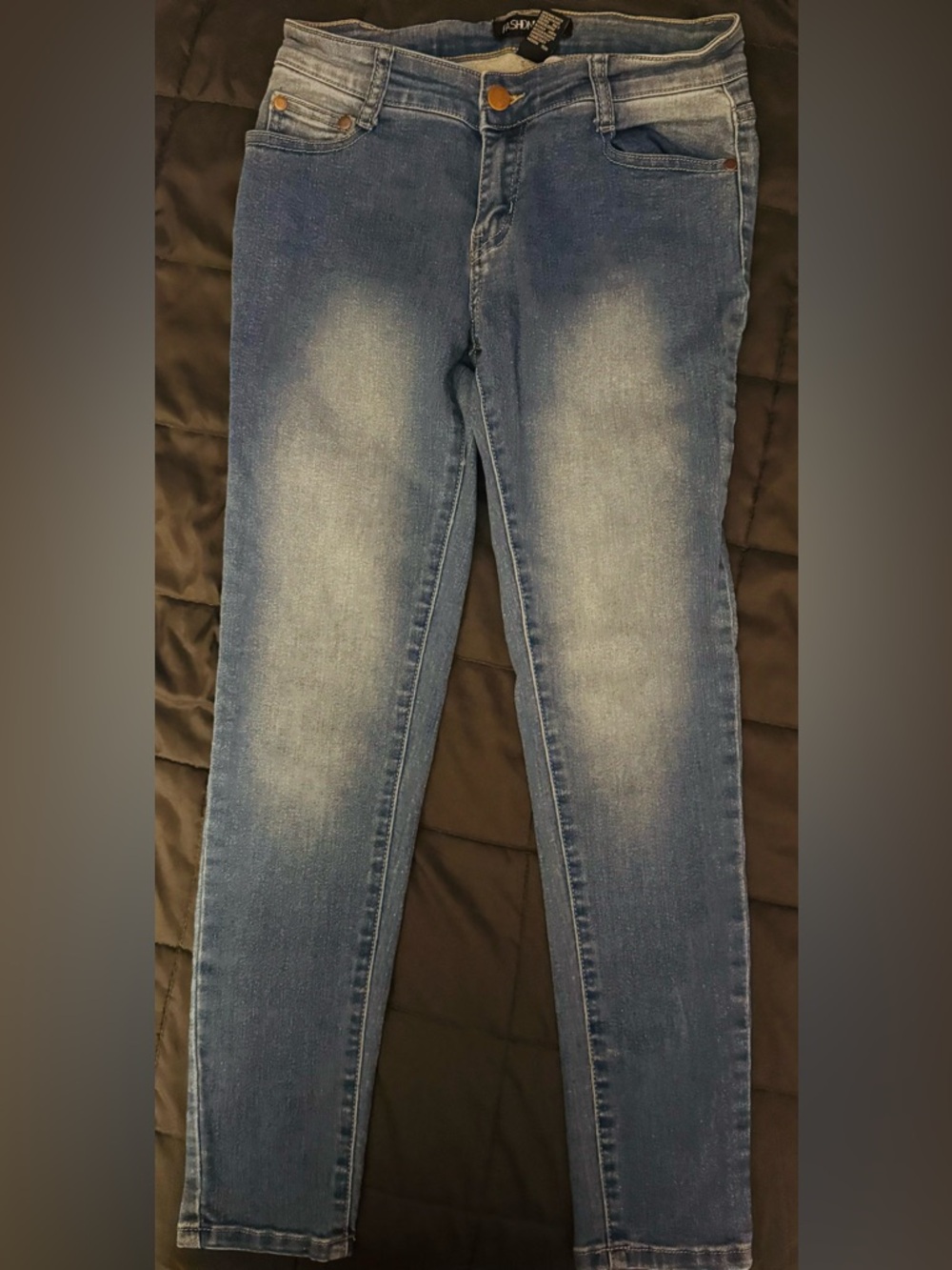 Fashion Nova Blue Fade  shredded back Skinny Jeans